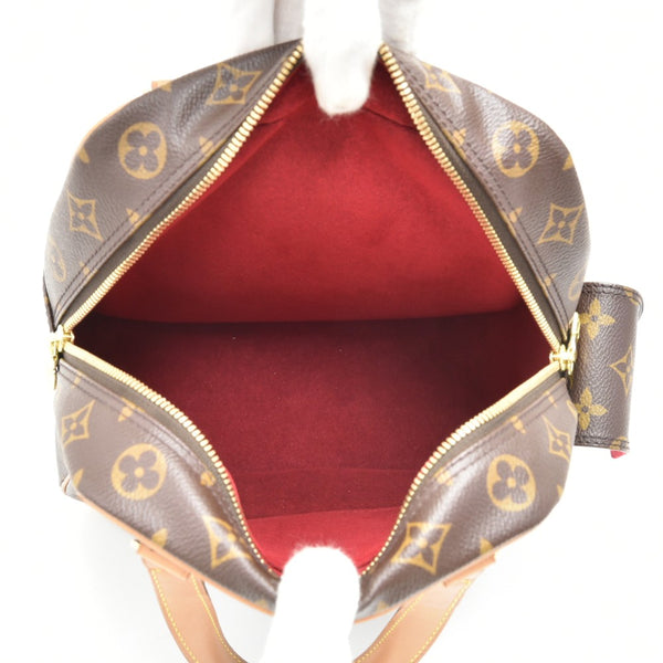 Louis Vuitton Excentri Cite Monogram Canvas Handbag LV Purse