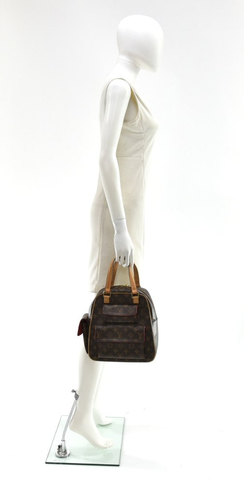 Louis Vuitton Excentri Cite Monogram Canvas Handbag