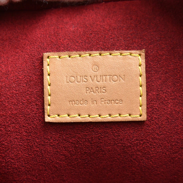 Louis Vuitton Excentri Cite Monogram Canvas Handbag