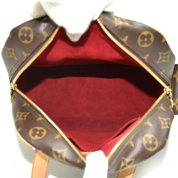 Louis Vuitton Excentri Cite Monogram Canvas Handbag